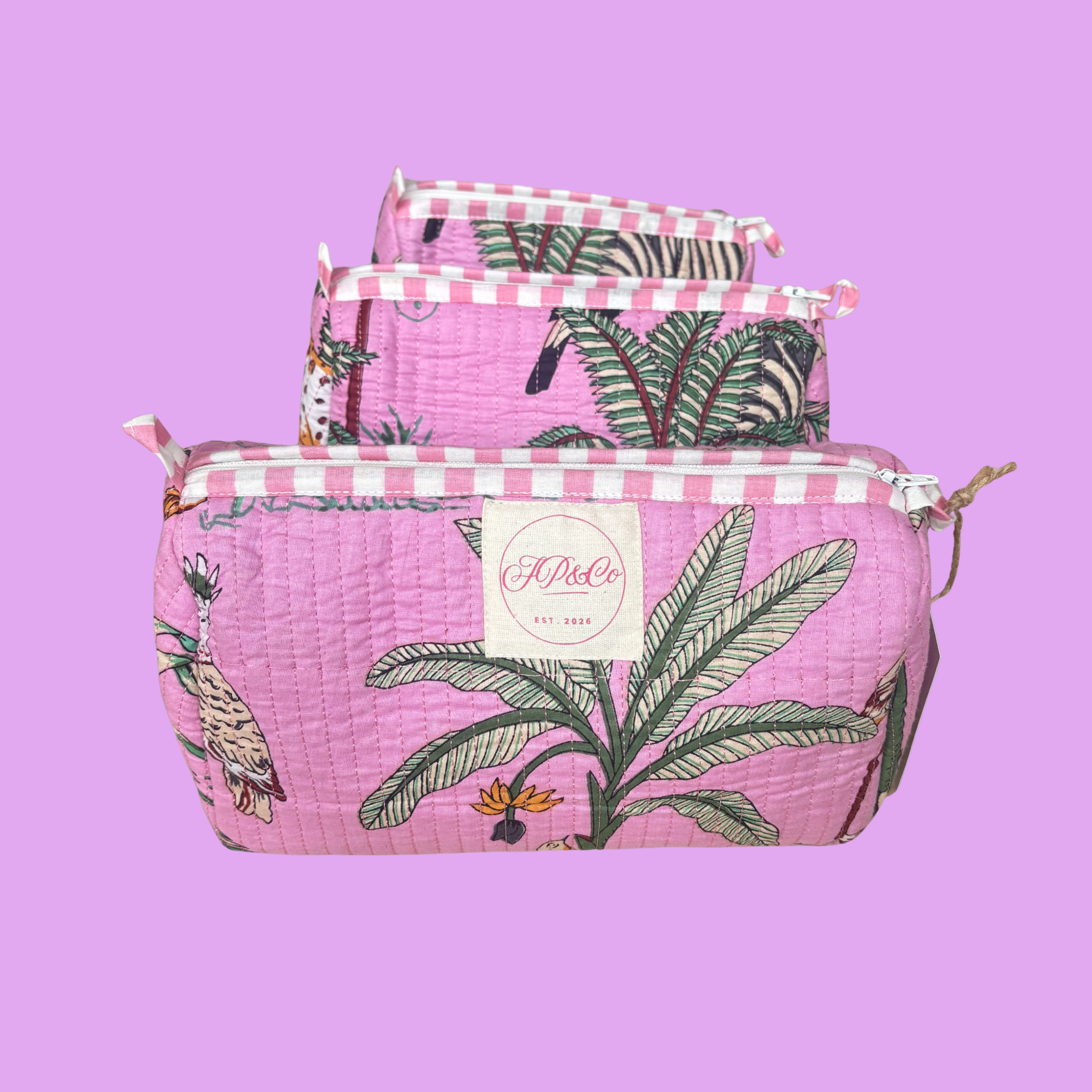 JP&Co. Pink Tropical Set of 3 Wash Bags on a pink background
