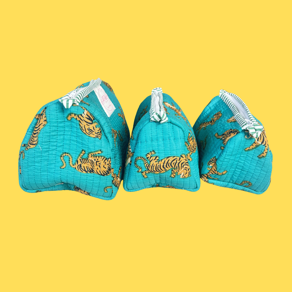 Turquoise Tiger set of 3 Wash bags Side View on a yellow background